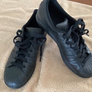 Men’s  Adidas walking sneakers,  black, 9.5 US worn twice, great condition.